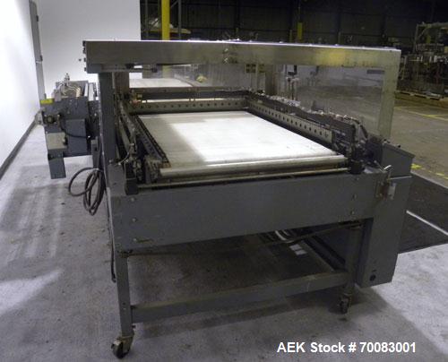 Used ShanklinAutomatic L Bar Sealer, Model A28A. Capable of speeds up to 25 Packages per minute. Seal size 31" wide x 43" long. Has hot knife seal and a package size range: (length) 7-1/2" to 41" (wi...