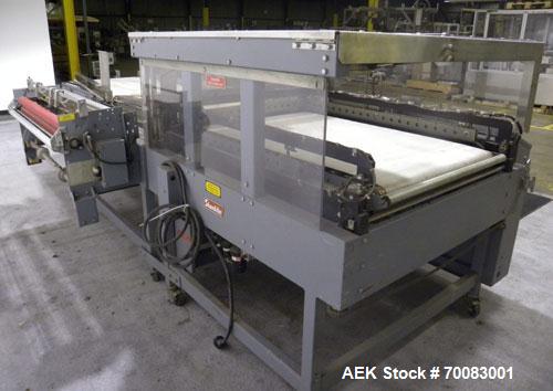 Used ShanklinAutomatic L Bar Sealer, Model A28A. Capable of speeds up to 25 Packages per minute. Seal size 31" wide x 43" long. Has hot knife seal and a package size range: (length) 7-1/2" to 41" (wi...