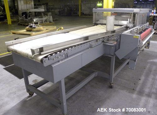 Used ShanklinAutomatic L Bar Sealer, Model A28A. Capable of speeds up to 25 Packages per minute. Seal size 31" wide x 43" long. Has hot knife seal and a package size range: (length) 7-1/2" to 41" (wi...