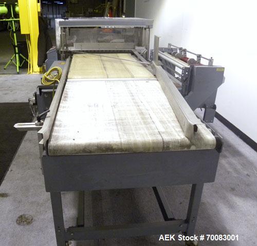 Used- ShanklinAutomatic L Bar Sealer, Model A28A. Capable of speeds up to 25 Packages per minute. Seal size 31" wide x 43" l...