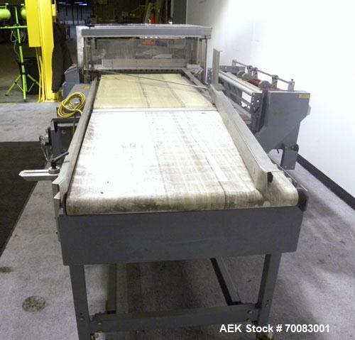 Used ShanklinAutomatic L Bar Sealer, Model A28A. Capable of speeds up to 25 Packages per minute. Seal size 31" wide x 43" long. Has hot knife seal and a package size range: (length) 7-1/2" to 41" (wi...