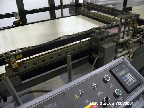 Used ShanklinAutomatic L Bar Sealer, Model A28A. Capable of speeds up to 25 Packages per minute. Seal size 31" wide x 43" long. Has hot knife seal and a package size range: (length) 7-1/2" to 41" (wi...
