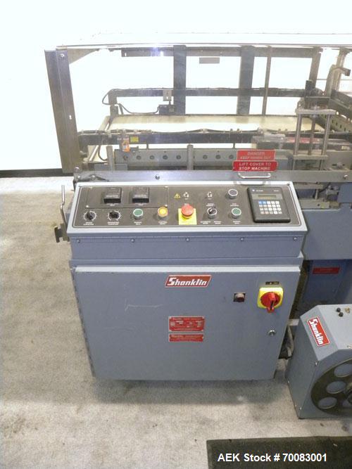 Used ShanklinAutomatic L Bar Sealer, Model A28A. Capable of speeds up to 25 Packages per minute. Seal size 31" wide x 43" long. Has hot knife seal and a package size range: (length) 7-1/2" to 41" (wi...