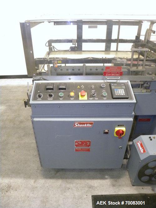 Used- ShanklinAutomatic L Bar Sealer, Model A28A. Capable of speeds up to 25 Packages per minute. Seal size 31" wide x 43" l...