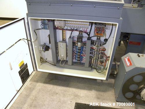 Used ShanklinAutomatic L Bar Sealer, Model A28A. Capable of speeds up to 25 Packages per minute. Seal size 31" wide x 43" long. Has hot knife seal and a package size range: (length) 7-1/2" to 41" (wi...