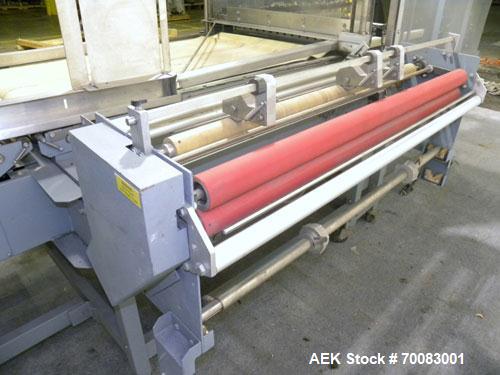 Used ShanklinAutomatic L Bar Sealer, Model A28A. Capable of speeds up to 25 Packages per minute. Seal size 31" wide x 43" long. Has hot knife seal and a package size range: (length) 7-1/2" to 41" (wi...