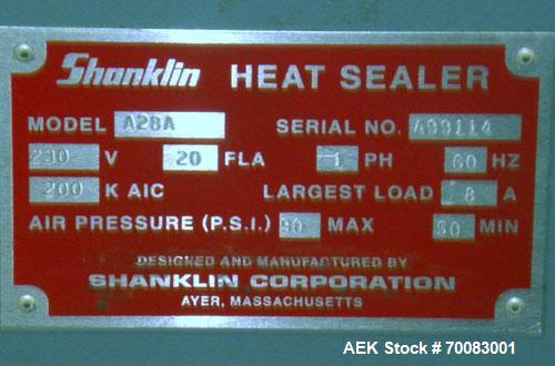 Used ShanklinAutomatic L Bar Sealer, Model A28A. Capable of speeds up to 25 Packages per minute. Seal size 31" wide x 43" long. Has hot knife seal and a package size range: (length) 7-1/2" to 41" (wi...