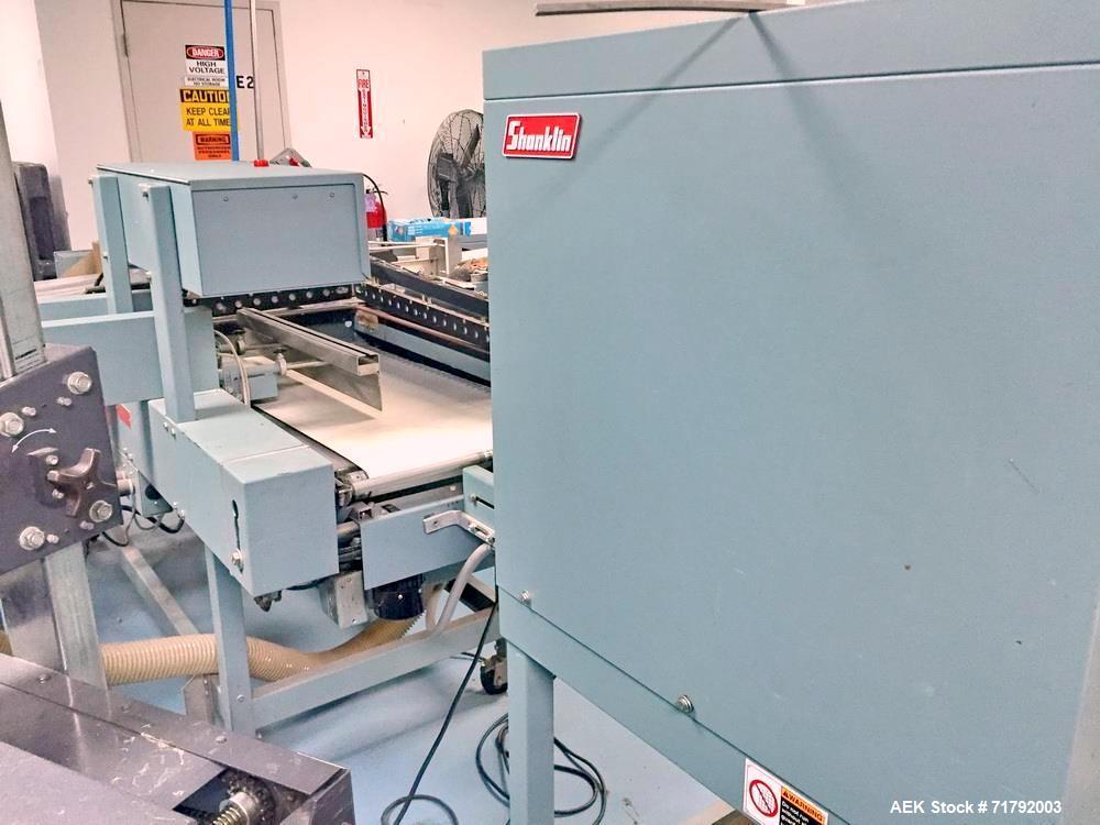 Used Shanklin M-22 Multi-Packer L-Sealer Shrink Wrapper with T6H Tunnel. Package speeds up to 25 bundles per minute (single stroke). Max seal area: 15" w x 24" l, minmum product length: 1.5". Maximum...
