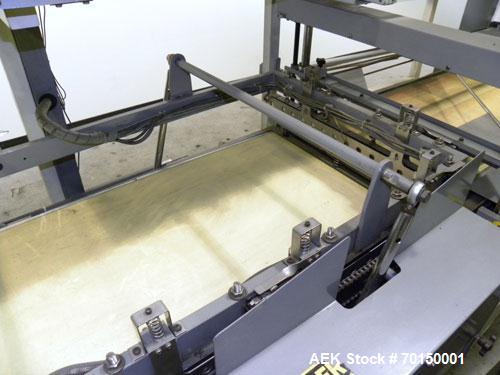 Used Texwrap Automatic L Bar Sealer, Model 3022. Capable of speeds up to 45 packages per minute. Has a package size range: width 2-3/4" to 20", length 4" to 29" and up to 9" high. Has auto infeed, pi...
