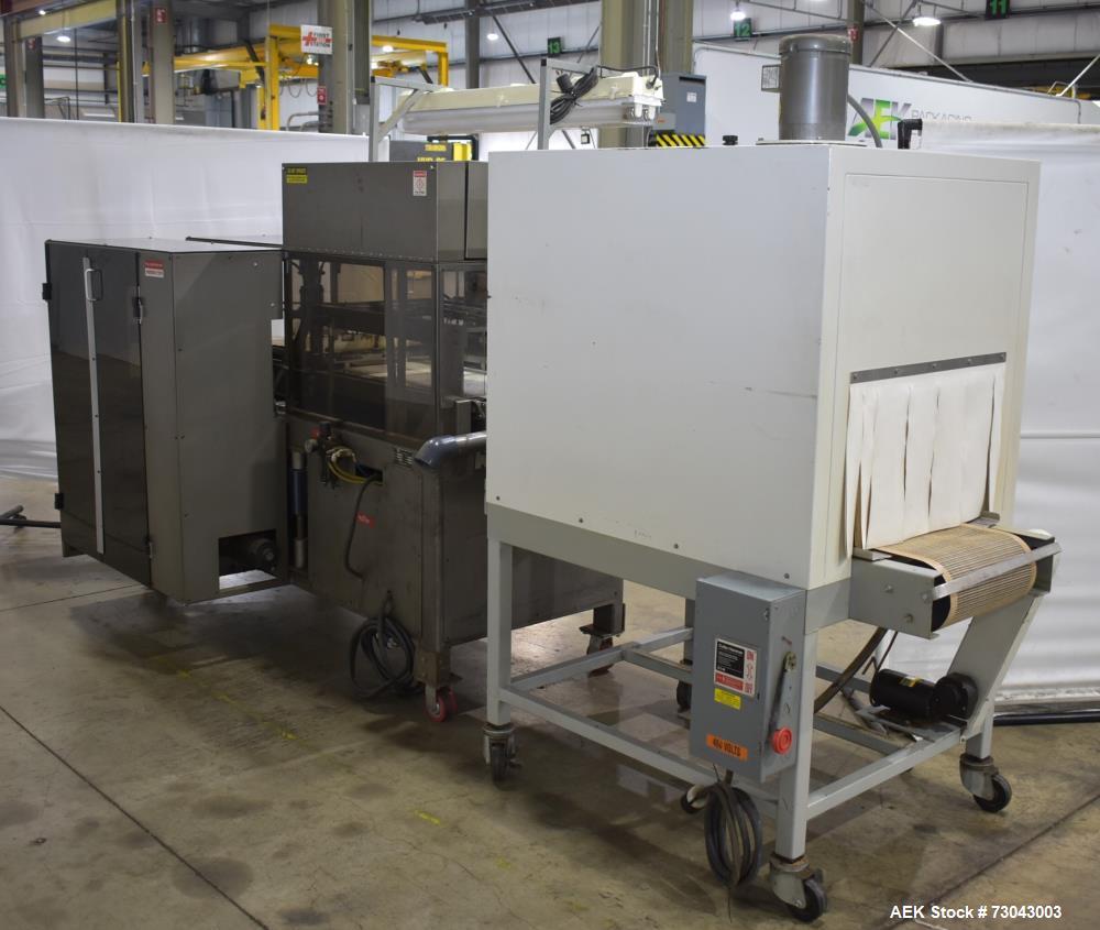 Used- TPA Model 1000 Automatic L-Bar Shrink Wrapper with Texwrap Model T1322 Shrink Tunnel. Wrapper has approximate 19"W x 2...