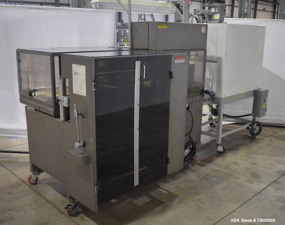 Used- TPA Model 1000 Automatic L-Bar Shrink Wrapper with Texwrap Model T1322 Shrink Tunnel. Wrapper has approximate 19"W x 2...