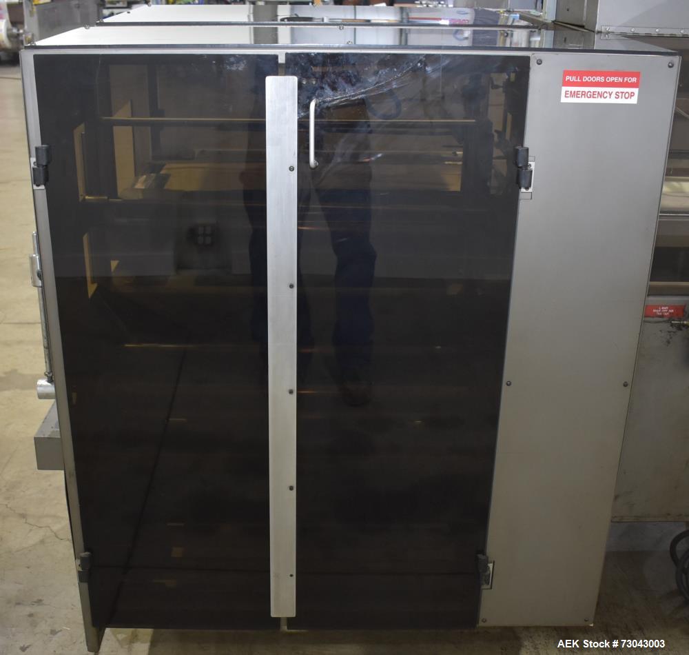Used- TPA Model 1000 Automatic L-Bar Shrink Wrapper with Texwrap Model T1322 Shrink Tunnel. Wrapper has approximate 19"W x 2...