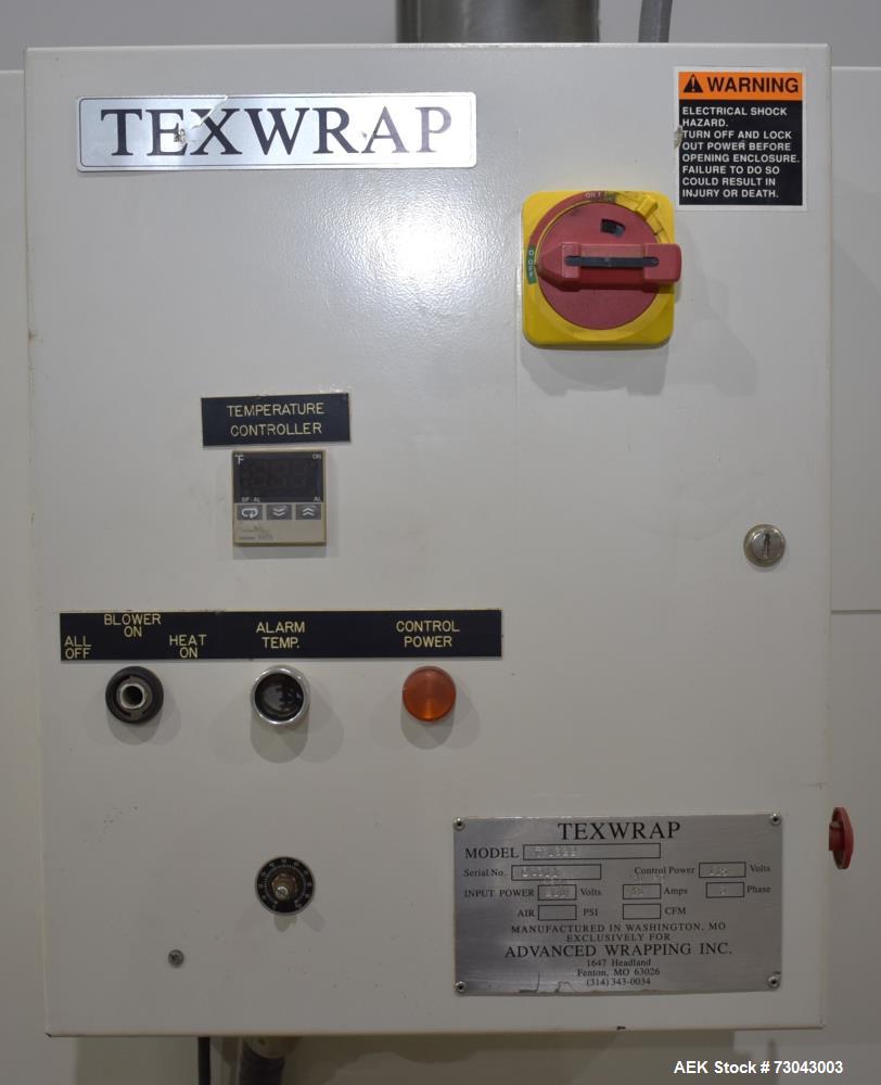 Used- TPA Model 1000 Automatic L-Bar Shrink Wrapper with Texwrap Model T1322 Shrink Tunnel. Wrapper has approximate 19"W x 2...