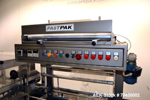 Used Weldotron FastPak 1022 Automatic L-Bar Sealer. Capable of speeds up to 25 packages per minute. Has a package size range:  minimum 4" long x 3" wide x 1/4" high up to 24" long x 20" wide x 6" hig...
