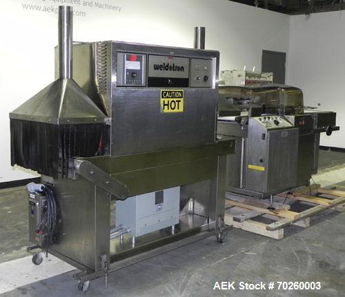 Used Weldotron 5962 Stainless Steel Automatic L-bar Sealer capable of speeds up to 25 packages per minute. Has an 18" wide x 22" long seal area with a maximum package height of approximately 6". Pnue...
