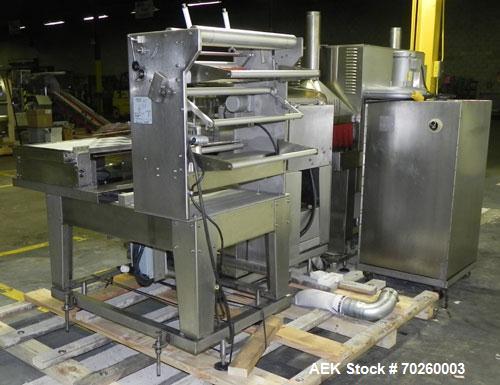 Used Weldotron 5962 Stainless Steel Automatic L-bar Sealer capable of speeds up to 25 packages per minute. Has an 18" wide x 22" long seal area with a maximum package height of approximately 6". Pnue...