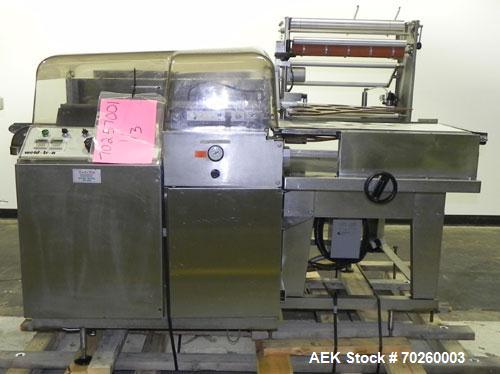 Used Weldotron 5962 Stainless Steel Automatic L-bar Sealer capable of speeds up to 25 packages per minute. Has an 18" wide x 22" long seal area with a maximum package height of approximately 6". Pnue...