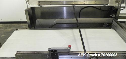 Used Weldotron 5962 Stainless Steel Automatic L-bar Sealer capable of speeds up to 25 packages per minute. Has an 18" wide x 22" long seal area with a maximum package height of approximately 6". Pnue...