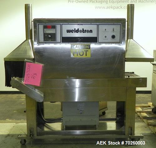 Used Weldotron 5962 Stainless Steel Automatic L-bar Sealer capable of speeds up to 25 packages per minute. Has an 18" wide x 22" long seal area with a maximum package height of approximately 6". Pnue...