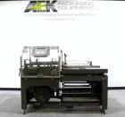 Used Clamco Automatic L-Bar Sealer, Model 6650. Can perform at speeds of up to 35 packages per minute. 6600 Series shrink wrappers feature a seal area of 18