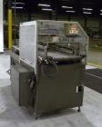 Used Clamco Automatic L-Bar Sealer, Model 6650. Can perform at speeds of up to 35 packages per minute. 6600 Series shrink wrappers feature a seal area of 18