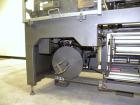 Used Clamco Automatic L-Bar Sealer, Model 6650. Can perform at speeds of up to 35 packages per minute. 6600 Series shrink wrappers feature a seal area of 18