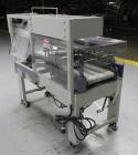 Used Conflex Model E-250 HS Automatic L Bar Sealer and Shrink Wrapper. The model E-250 HS is capable of speeds up to 35 packages per minute. Seal bar is 17