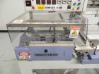 Used Conflex Model E-250 HS Automatic L Bar Sealer and Shrink Wrapper. The model E-250 HS is capable of speeds up to 35 packages per minute. Seal bar is 17