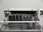 Used Conflex Model E-250 HS Automatic L Bar Sealer and Shrink Wrapper. The model E-250 HS is capable of speeds up to 35 packages per minute. Seal bar is 17