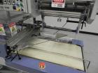 Used Conflex Model E-250 HS Automatic L Bar Sealer and Shrink Wrapper. The model E-250 HS is capable of speeds up to 35 packages per minute. Seal bar is 17