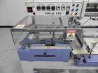 Used Conflex Model E-250 HS Automatic L Bar Sealer and Shrink Wrapper. The model E-250 HS is capable of speeds up to 35 packages per minute. Seal bar is 17