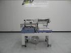 Used Conflex Model E-250 HS Automatic L Bar Sealer and Shrink Wrapper. The model E-250 HS is capable of speeds up to 35 packages per minute. Seal bar is 17