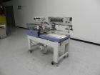 Used Conflex Model E-250 HS Automatic L Bar Sealer and Shrink Wrapper. The model E-250 HS is capable of speeds up to 35 packages per minute. Seal bar is 17