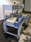 Used Conflex Model E-250C Automatic L Bar Sealer and Shrink Wrapper. Capable of speeds up to 35 packages per minute. Seal bar is 16