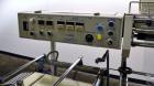 Used Conflex Model E-250C Automatic L Bar Sealer and Shrink Wrapper. Capable of speeds up to 35 packages per minute. Seal bar is 16