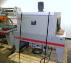 Used Evolution Machinery Automatic L-Bar Sealer and Shrink Tunnel