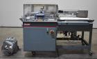 Used- Shanklin Automatic L-Bar Sealer, Model A26A. Capable of speeds up to 35 packages per minute. Has a maximum 24