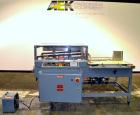 Used Shanklin A27A Automatic L bar Sealer capable of speeds up to 35 packages per minute.Has hot knife seal and a package size range:length 4