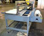 Used Shanklin A27A Automatic L bar Sealer capable of speeds up to 35 packages per minute.Has hot knife seal and a package size range:length 4