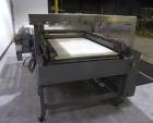 Used ShanklinAutomatic L Bar Sealer, Model A28A. Capable of speeds up to 25 Packages per minute. Seal size 31