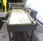 Used ShanklinAutomatic L Bar Sealer, Model A28A. Capable of speeds up to 25 Packages per minute. Seal size 31