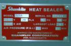 Used ShanklinAutomatic L Bar Sealer, Model A28A. Capable of speeds up to 25 Packages per minute. Seal size 31