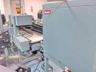 Used Shanklin M-22 Multi-Packer L-Sealer Shrink Wrapper with T6H Tunnel. Package speeds up to 25 bundles per minute (single stroke). Max seal area: 15