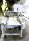 Used Texwrap Automatic L Bar Sealer, Model 3022-NFS-CC-VS4. Capable of speeds up to 45 packages per minute. Has a package size range: (width) 2-3/4