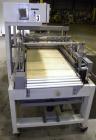 Used Texwrap Automatic L Bar Sealer, Model 3022. Capable of speeds up to 45 packages per minute. Has a package size range: width 2-3/4
