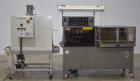 Used- TPA Model 1000 Automatic L-Bar Shrink Wrapper with Texwrap Model T1322 Shrink Tunnel. Wrapper has approximate 19