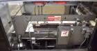 Used- TPA Model 1000 Automatic L-Bar Shrink Wrapper with Texwrap Model T1322 Shrink Tunnel. Wrapper has approximate 19