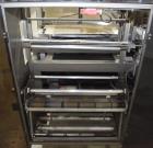 Used- TPA Model 1000 Automatic L-Bar Shrink Wrapper with Texwrap Model T1322 Shrink Tunnel. Wrapper has approximate 19