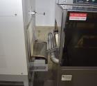 Used- TPA Model 1000 Automatic L-Bar Shrink Wrapper with Texwrap Model T1322 Shrink Tunnel. Wrapper has approximate 19