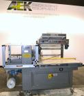 Used Weldotron FastPak 1022 Automatic L-Bar Sealer. Capable of speeds up to 25 packages per minute. Has a package size range:  minimum 4